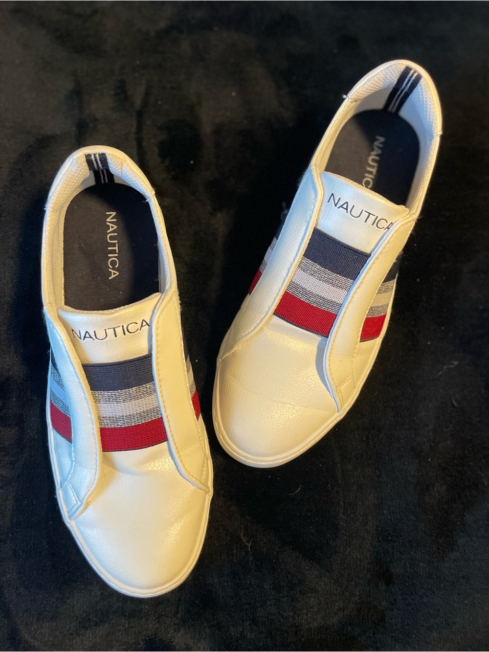 Nautica  Women’s White Slip-On Sneakers with Red & Navy Stripes